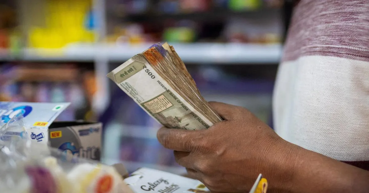 rupee-drops-early-trade-against-us-dollar