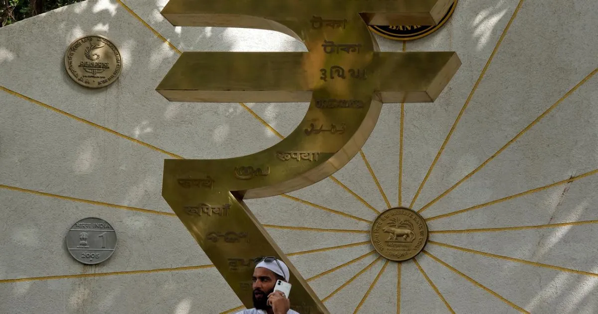 rupee-rises-14-paise-usd