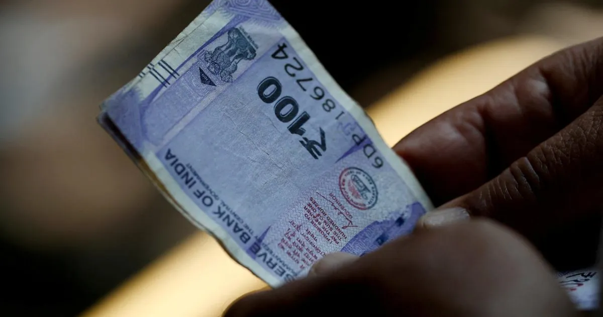 rupee-closes-lower-forex-reserves-decline